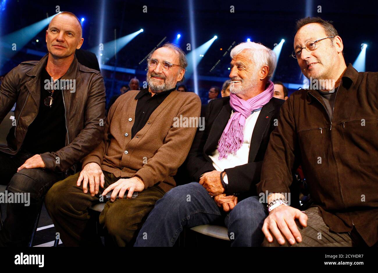 From L To R British Singer Sting And French Actors Claude Brasseur Jean Paul Belmondo And Jean Reno Wait For The Title Fight Of Heavyweight Boxing Title Holder Vladimir Klitschko Of Ukraine And