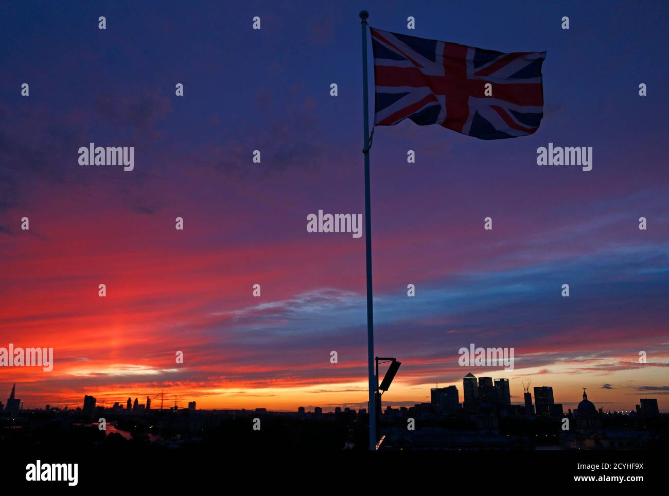 The Union flag is seen at Greenwich Park as the sun sets over the city of London July 30, 2012.     REUTERS/Eddie Keogh (BRITAIN - Tags: SPORT OLYMPICS CITYSPACE) Stock Photo