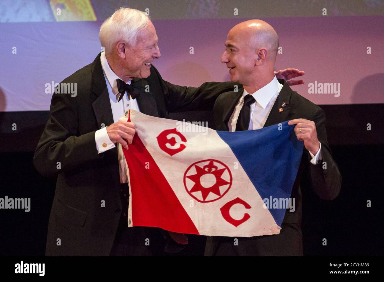 Amazon Ceo And Chairman Jeff Bezos R Returns The Explorers Club Flag To Explorers Club President Amazon Ceo And Chairman Jeff Bezos R Returns The Explorers Club Flag To Explorers Club President