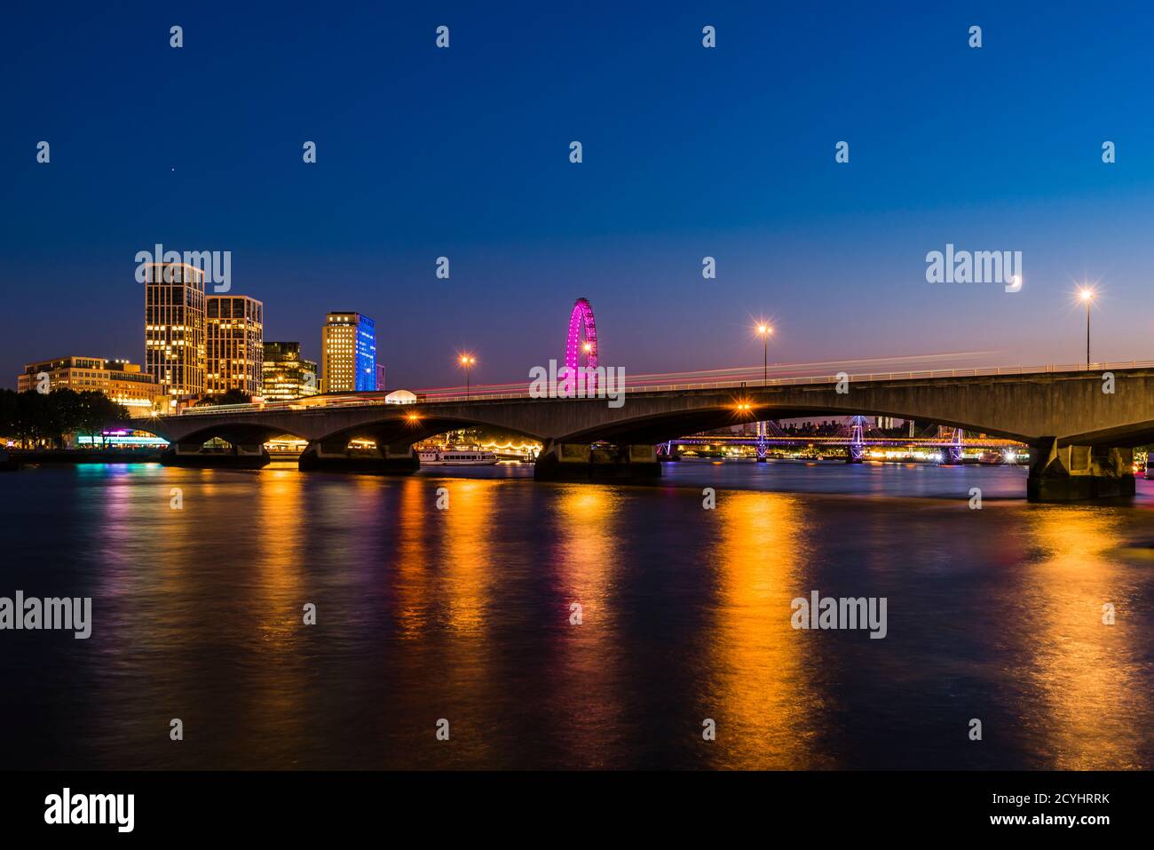 Lights on the River Thames around Waterloo Bridge at dusk, Westminster