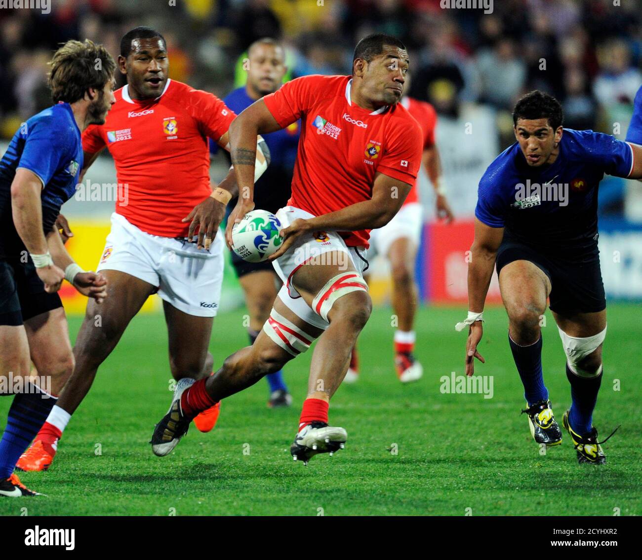 Tonga's Viliami Ma'afu passes the ball during their Rugby World Cup Pool A  match against France at Wellington Regional Stadium in Wellington October  1, 2011. REUTERS/Anthony Phelps (NEW ZEALAND - Tags: SPORT