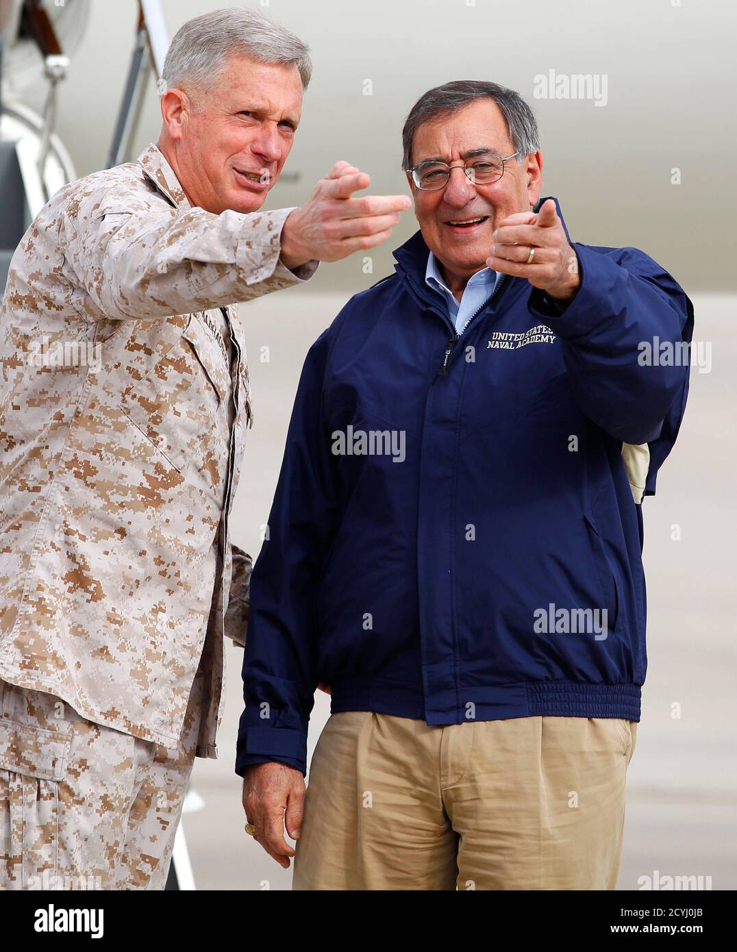 U.S. Secretary of Defense Leon Panetta (R) is greeted by  Lt. General Thomas Waldhauser of 1st Marine Expeditionary Force upon his arrival at Camp Pendleton March 30, 2012.   REUTERS/ Mike Blake    (UNITED STATES - Tags: MILITARY POLITICS) Stock Photo