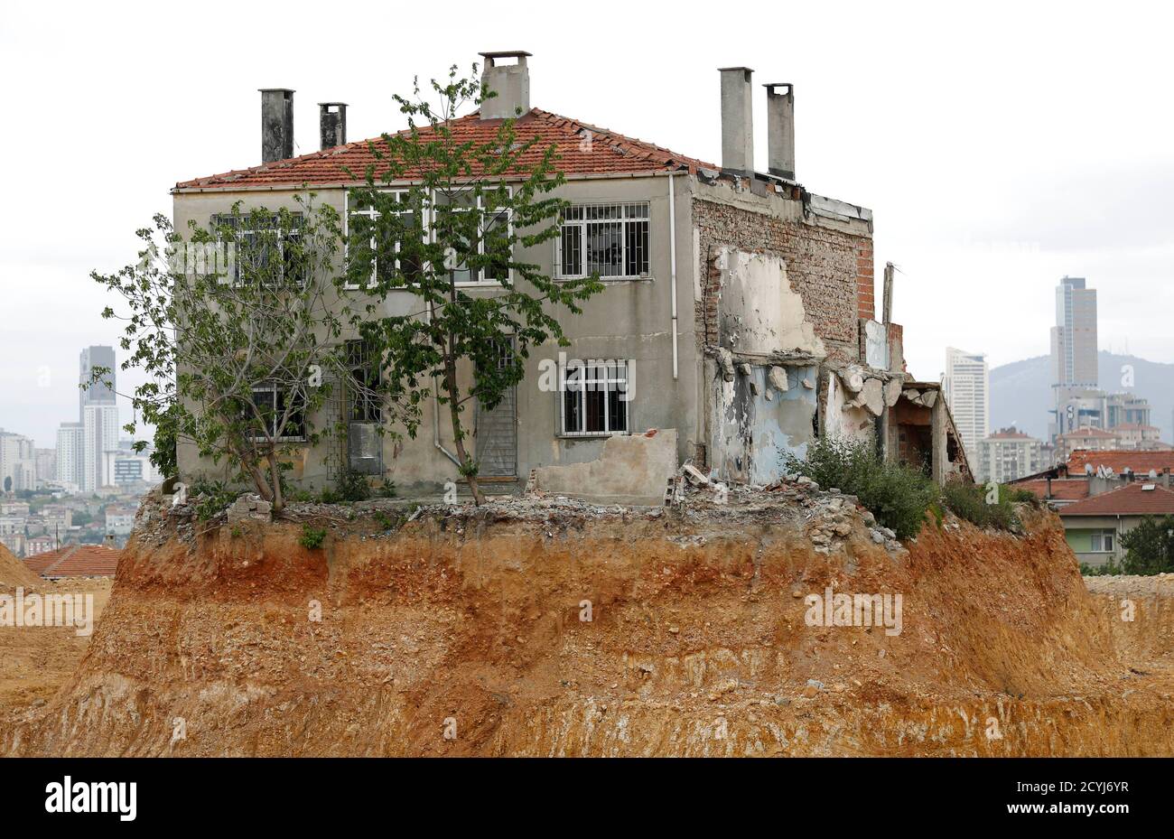 A Lone House Is Seen At A Construction Site Of An Urban Transformation Project In Fikirtepe