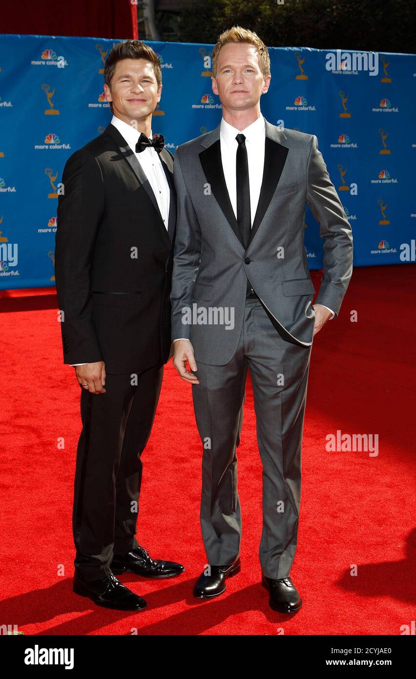 Actor David Burtka (L) and his partner, actor Neil Patrick Harris from the  comedy 'How I Met Your Mother', pose at the 62nd annual Primetime Emmy  Awards in Los Angeles, California August