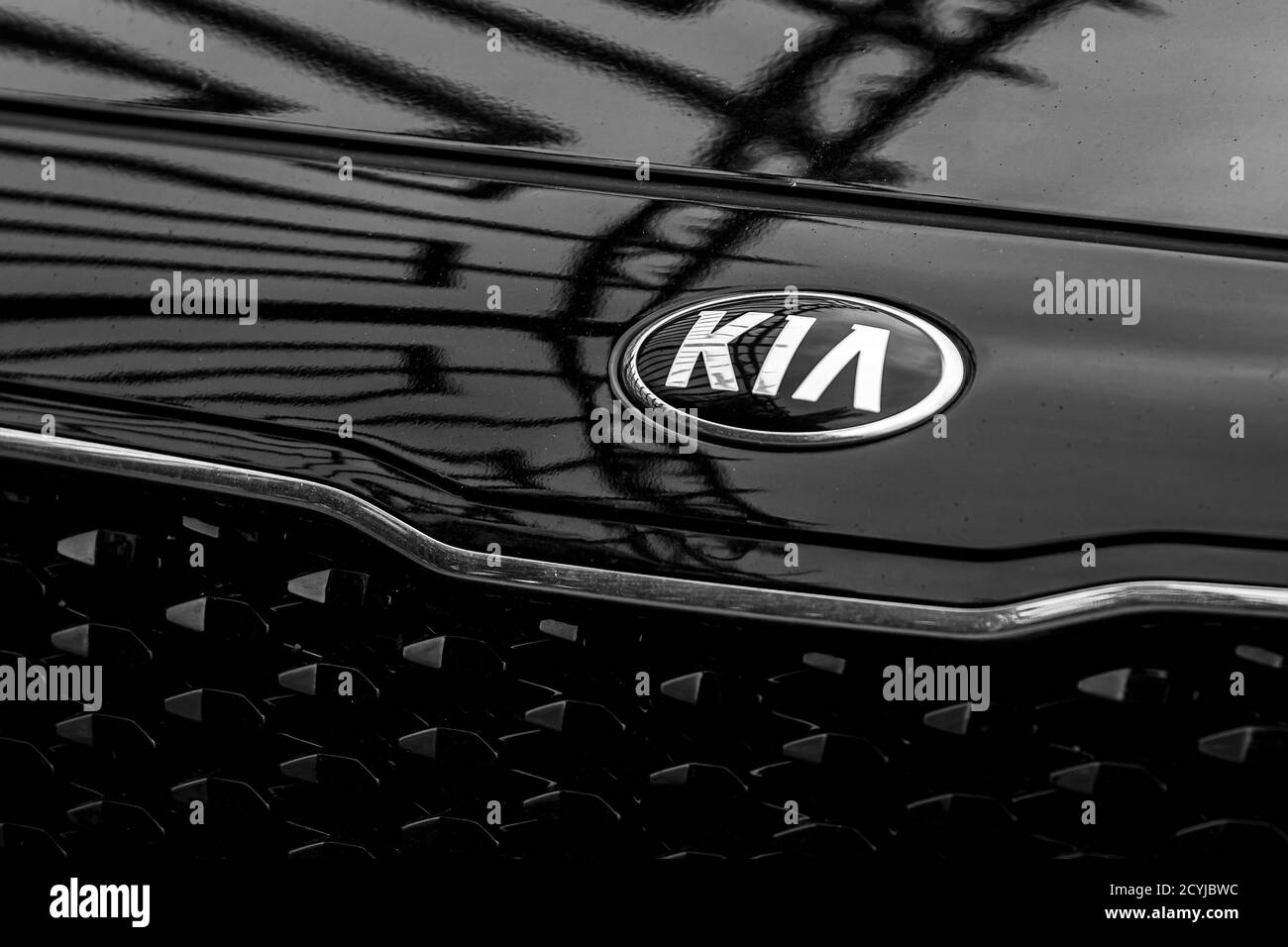 Russia, Kaluga - SEPTEMBER 29, 2020: Chromed Kia Motors logo on a black hood of a new car. Stock Photo