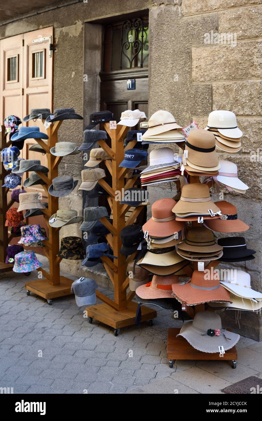 Hat Stand including Floppy Hats, Stetsons, Panama Hats, Straw Hats & Caps Outside Hat Shop in Castellane Alpes-de-Haute-Provence Provence France Stock Photo