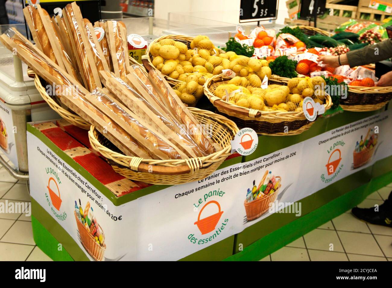 Foodstuffs which comprise the 'basic food shopping basket' are on display  at a supermarket in Charenton near Paris April 6, 2011. REUTERS/Charles  Platiau (FRANCE - Tags: SOCIETY POLITICS FOOD Stock Photo - Alamy