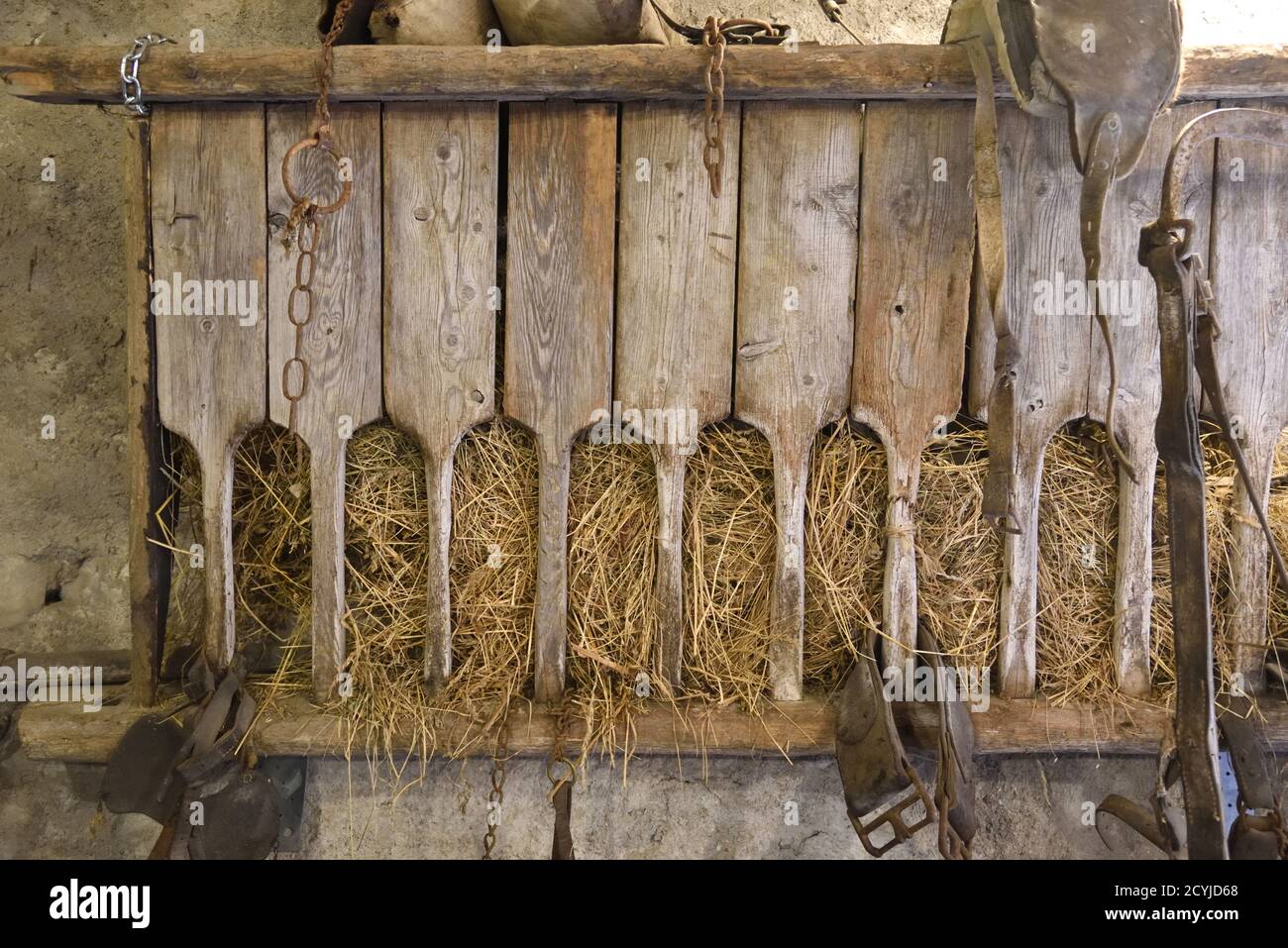 Old Wooden Hay Feeder or Trough in Old Farmhouse, Stables, Barn or Farm Building Provence France Stock Photo