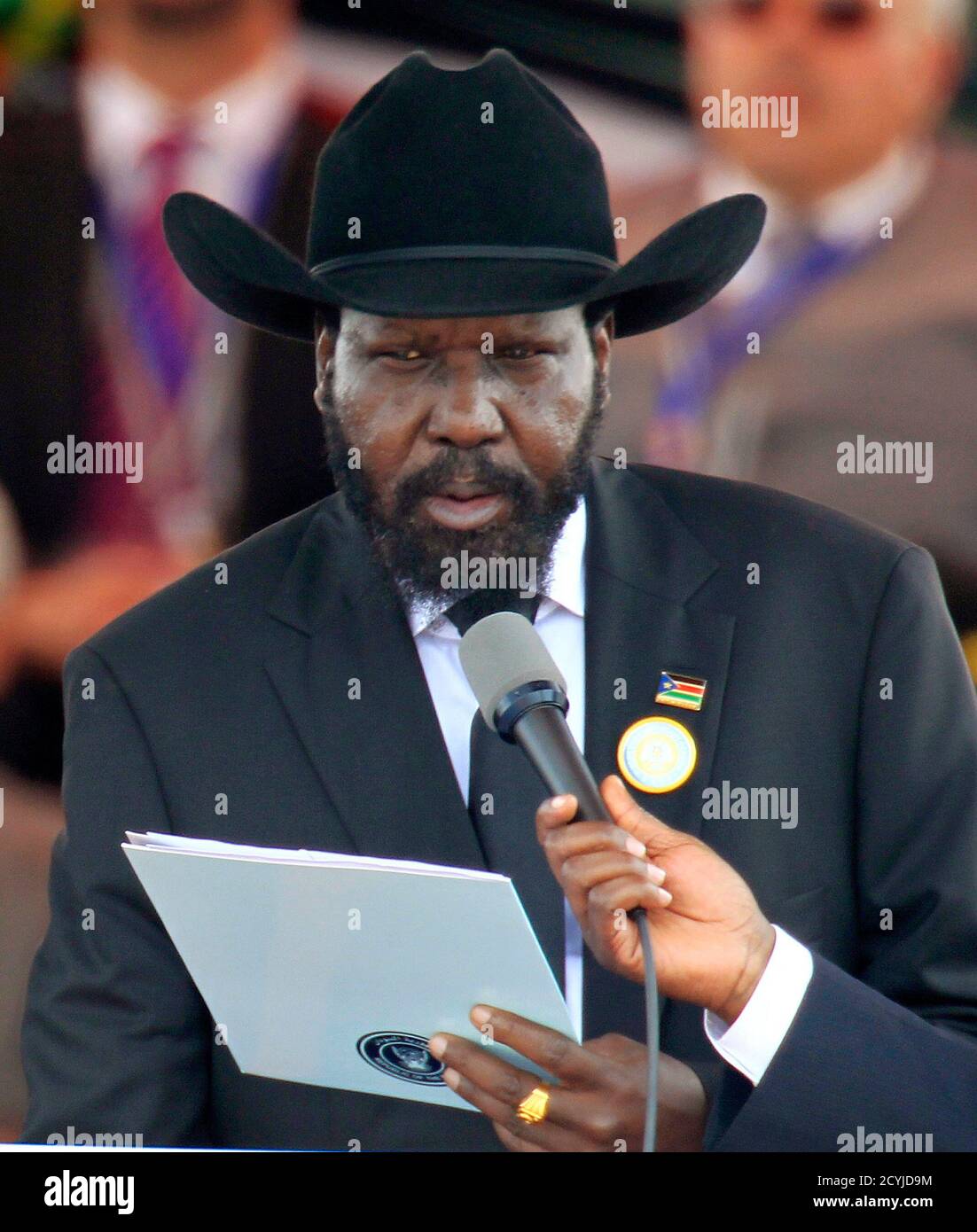 Salva Kiir takes his oath of office as South Sudan's President during the Independence Day celebrations in the capital Juba July 9, 2011. Kiir promised to bring peace to troubled border areas and offered an amnesty to armed groups fighting his government, hours after his state declared independence from the north on Saturday. South Sudan seceded on Saturday -- a separation won in a January referendum that was the climax of a 2005 peace deal which ended decades of civil war with the north.  REUTERS/Thomas Mukoya (SOUTH SUDAN - Tags: POLITICS) Stock Photo