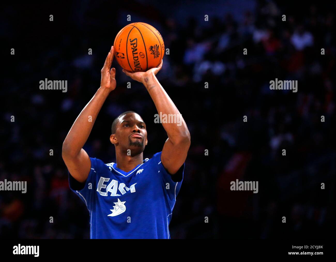 East All-Star Chris Bosh of the Miami Heat takes part in the All-Star  Shooting Stars competition during the NBA basketball All-Star weekend in  Houston, Texas, February 16, 2013. REUTERS/Jeff Haynes (UNITED STATES -