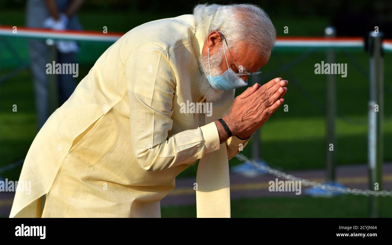 New Delhi, India. 2nd October, 2020. Indian Prime Minister Narendra Modi arrives to pay tributes at Rajghat, the memorial dedicated to Mahatma Gandhi, on the birth anniversary of the independence leader in New Delhi. Credit: PRASOU/Alamy Live News Stock Photo