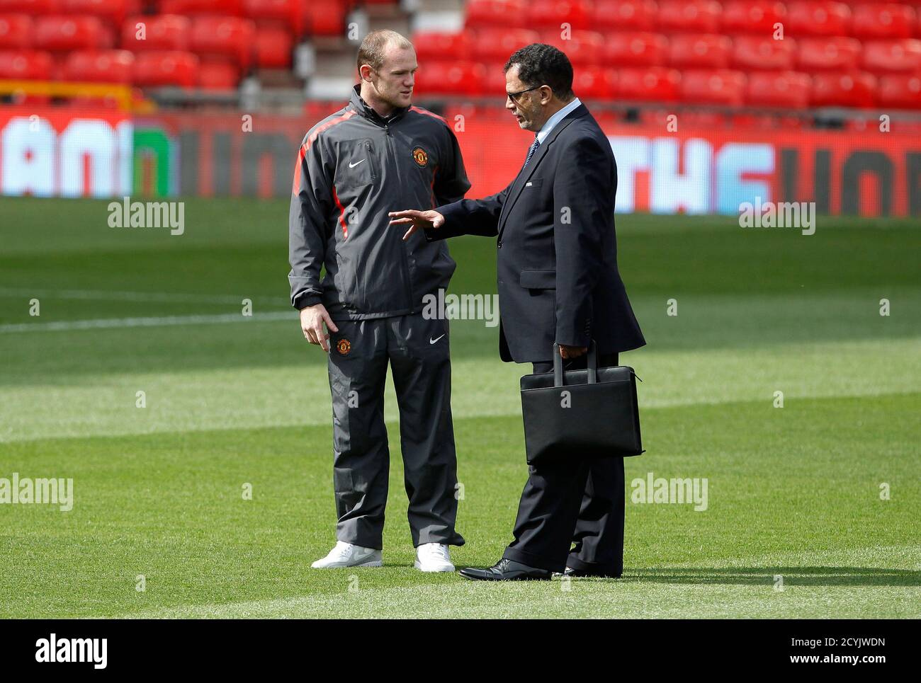 Manchester United's Wayne Rooney speaks with Danny Jordaan of ...