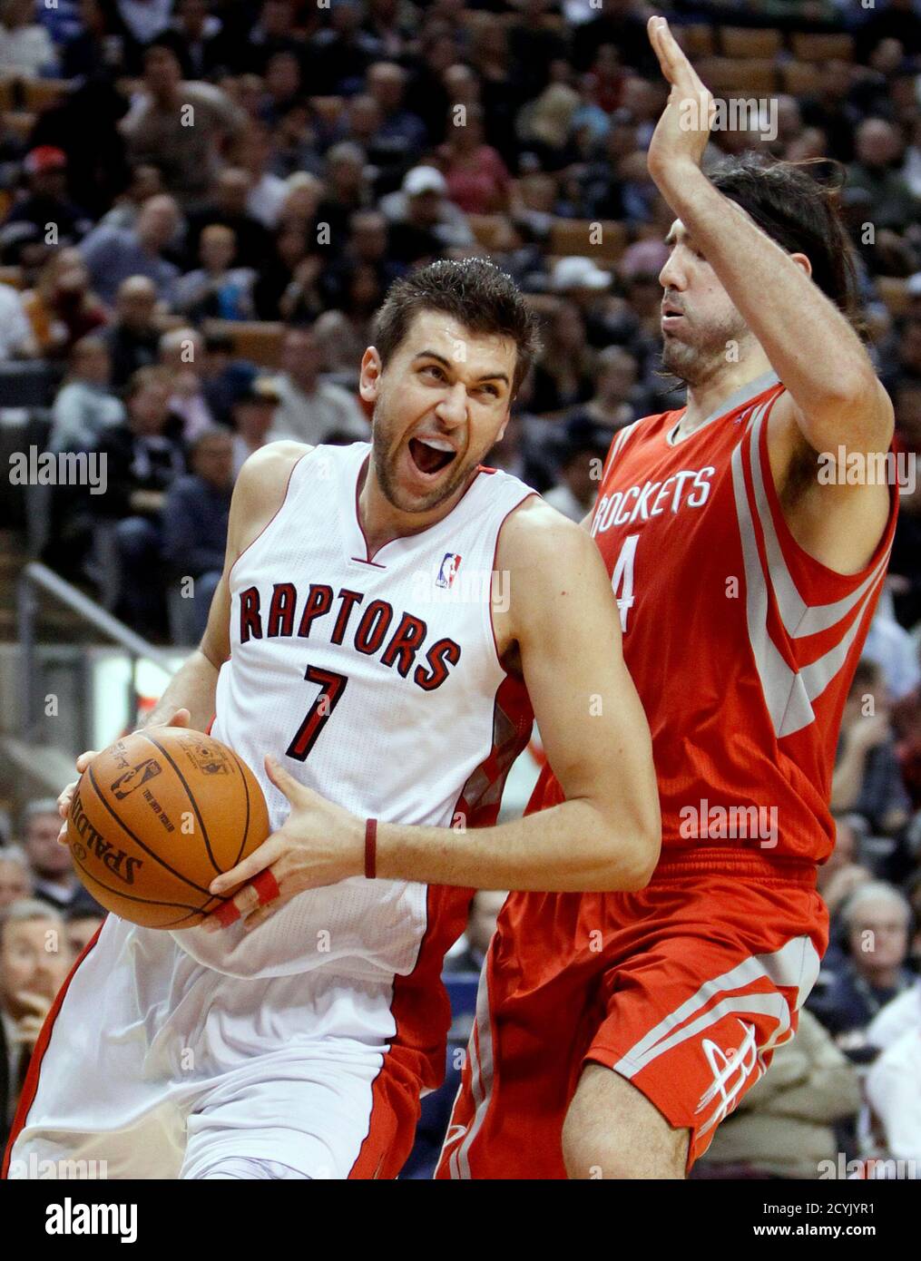 Toronto Raptors Andrea Bargnani Goes To The Basket Against Houston Rockets Luis Scola R During The First Half Of Their Nba Basketball Game In Toronto November 19 2010 Reuters Mark Blinch Canada