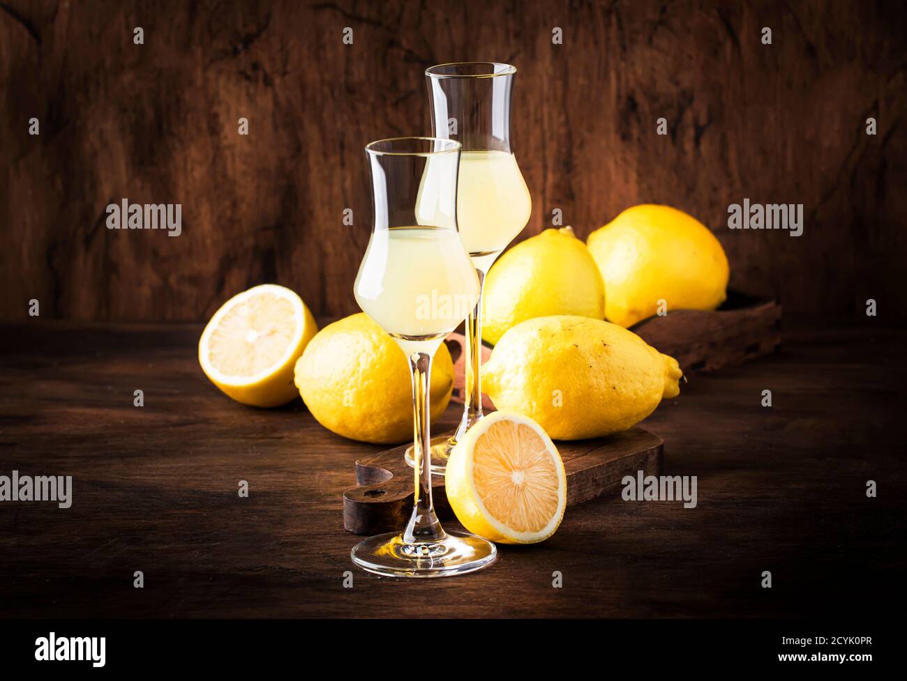Limoncello, sour sweet Italian lemon liqueur, traditional strong alcoholic drink. Copy space, selective focus Stock Photo