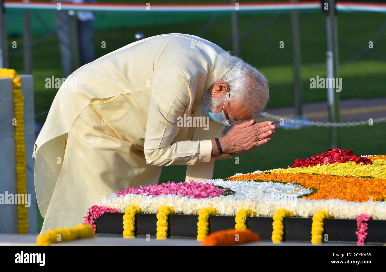 New Delhi, India. 2nd October, 2020. Indian Prime Minister Narendra Modi pays homage to Mahatma Gandhi on the occasion of his 151st  birth anniversary at Rajghat in New Delhi. Credit: PRASOU/Alamy Live News Stock Photo