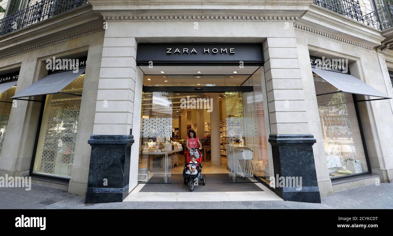 A woman leaves a Zara Home shop (Inditex group) in Barcelona, Spain, June  10, 2015. Spain's Inditex, the owner of Zara fashion stores, reported a  better than expected rise in quarterly profit