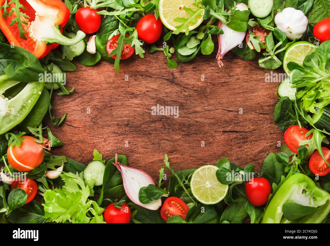 Healthy food background with various green herbs and vegetables ...