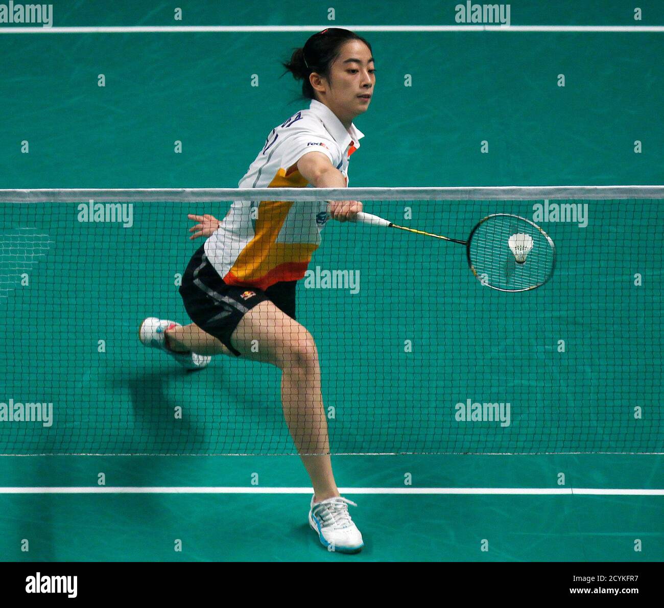 China's Wang Shixian returns a shot to South Korea's Bae Youn-joo during  their women's singles final match against at the 2010 Badminton World  Federation Super Series finals at the Hsinchuang stadium in