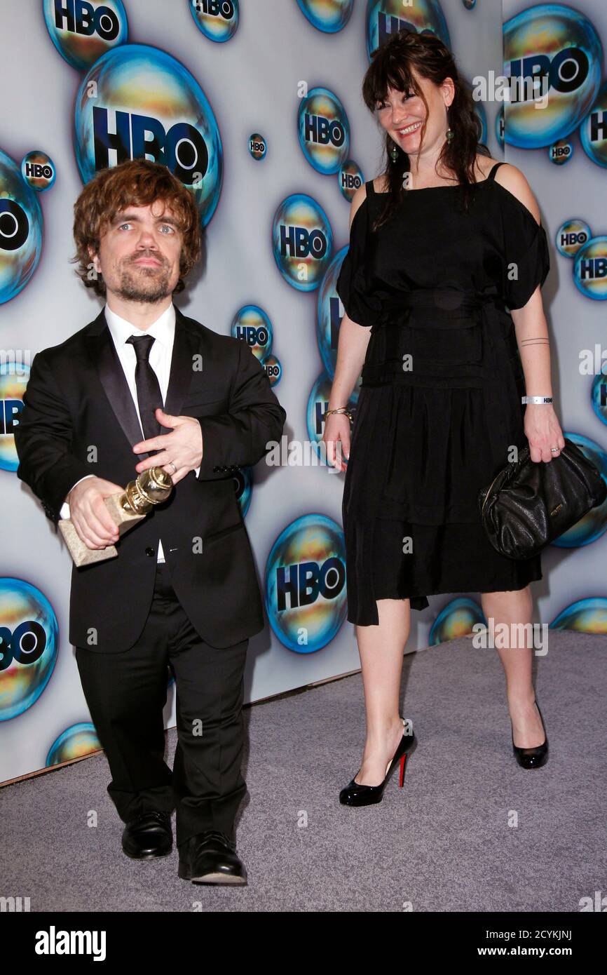 Peter Dinklage, winner of the award for best performance by an actor in a  supporting role in a series, mini-series or motion picture made for  television, for "Game of Thrones," holds his