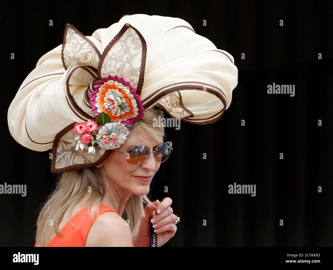 A Woman Wears A Fancy Hat At Churchill Downs In Louisville Kentucky Before The 138th Running Of The Kentucky Derby May 5 2012 Reuters Jeff Haynes United States Tags Sport Horse Racing