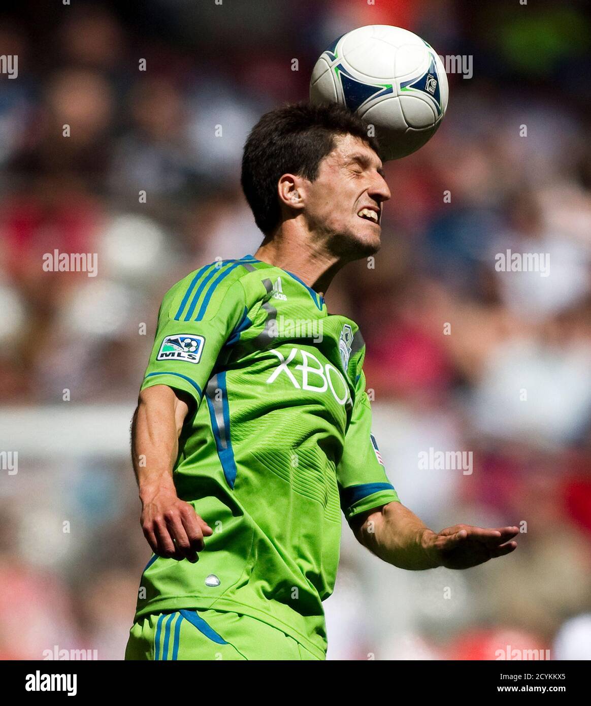 Seattle Sounders' Alvaro Fernandez heads the ball against while playing the Vancouver Whitecaps during the first half of their MLS soccer game in Vancouver, British Columbia May 19, 2012.   REUTERS/Ben Nelms    (CANADA - Tags: SPORT SOCCER) Stock Photo
