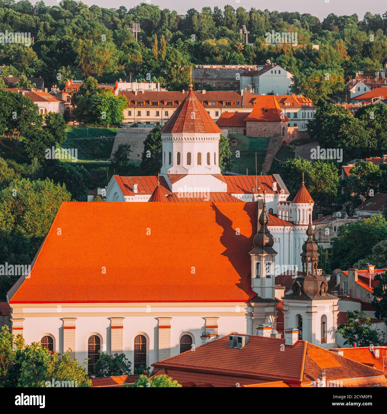 Vilnius, Lithuania. View to the Cathedral of the Theotokos in Vilnius, Lithuania In Summer. Old Town In Evening. Roofs of medieval churches Stock Photo