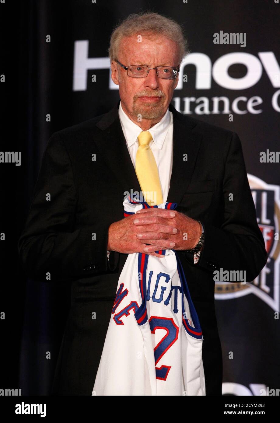 Nike founder Phil Knight holds his jersey given to him as a member of the  Basketball Hall of Fame class of 2012 during an announcement ceremony in  New Orleans, Louisiana April 2,