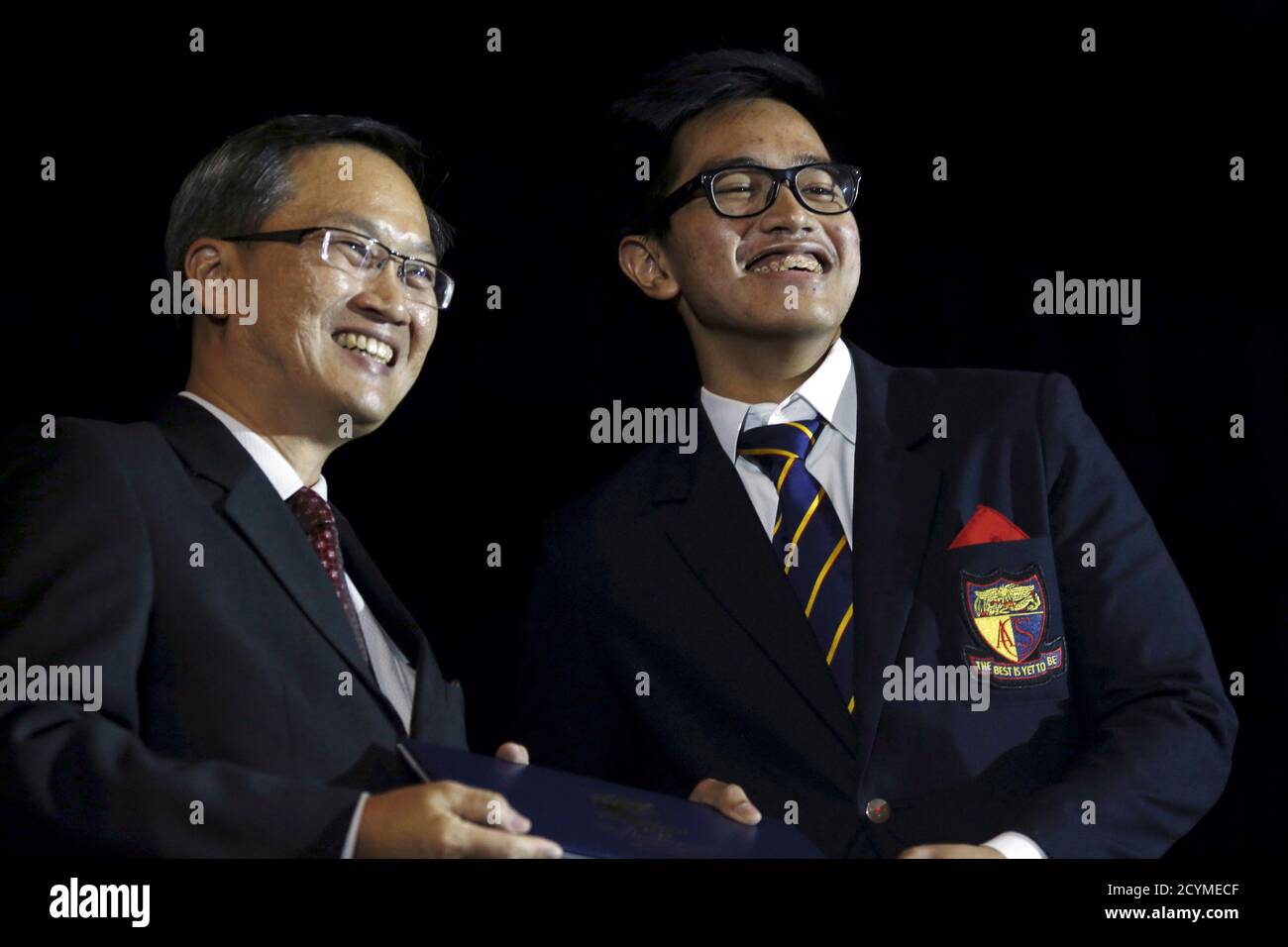 Kaesang Pangarep Son Of Indonesian President Joko Jokowi Widodo Receives His Baccalaureate During His Graduation Ceremony At Anglo Chinese School Acs International In Singapore November 21 2014 Jokowi On Friday Flew In To