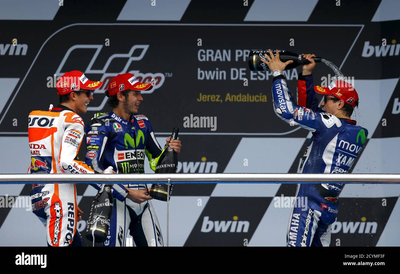 Yamaha Motogp Rider Jorge Lorenzo R Of Spain Celebrates In Front Of Honda Rider Marc Marquez L Of Spain And Yamaha Motogp Rider Valentino Rossi Of Italy After Winning The Spanish Grand
