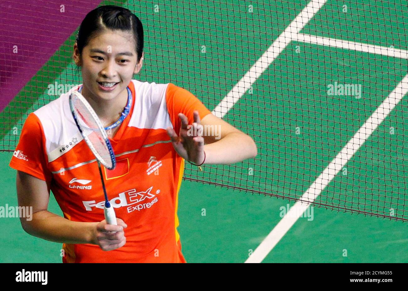 China's Wang Lin celebrates after defeating her compatriot Wang Xin during  their women's singles final at the 2010 Badminton World Championships at  the Coubertin stadium in Paris, August 29, 2010. REUTERS/Regis Duvignau (
