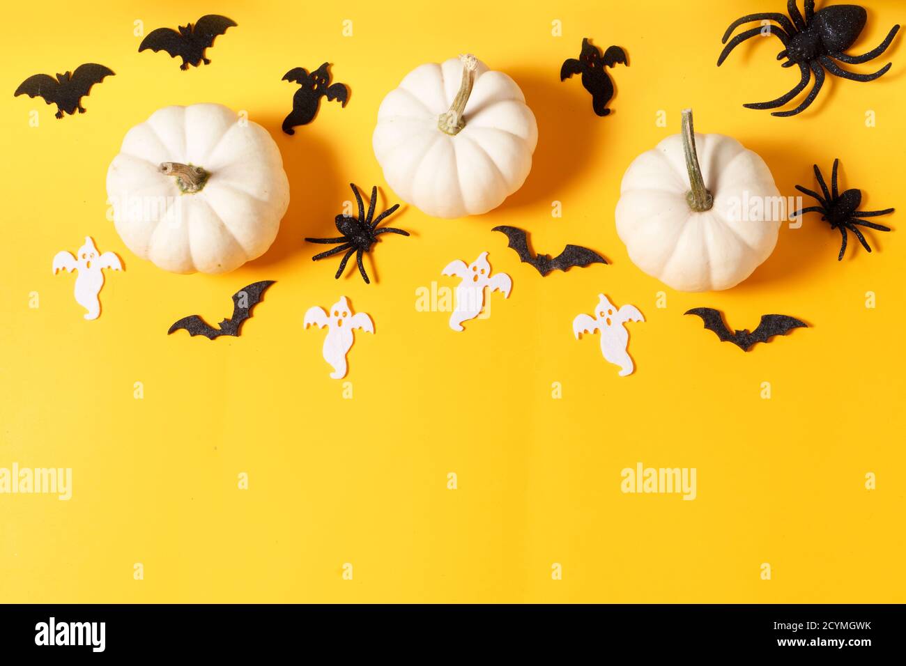 Halloween scene on orange background Stock Photo - Alamy