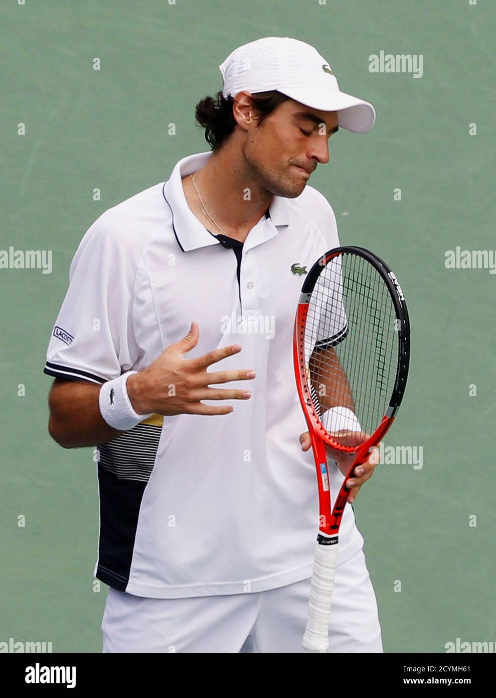 Jeremy Chardy of France reacts after a missed shot against Andy Roddick of  the U.S. during