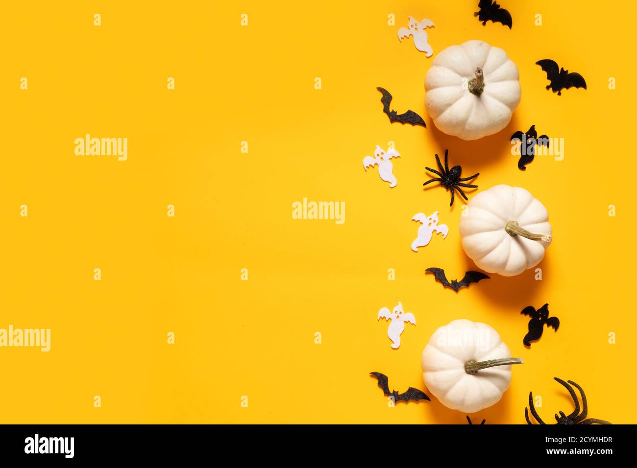 Halloween scene on orange background Stock Photo - Alamy