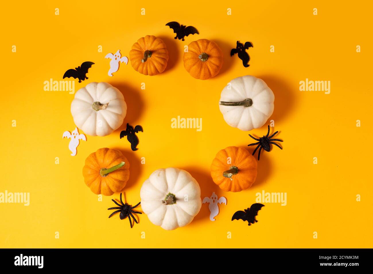 Halloween scene on orange background Stock Photo - Alamy