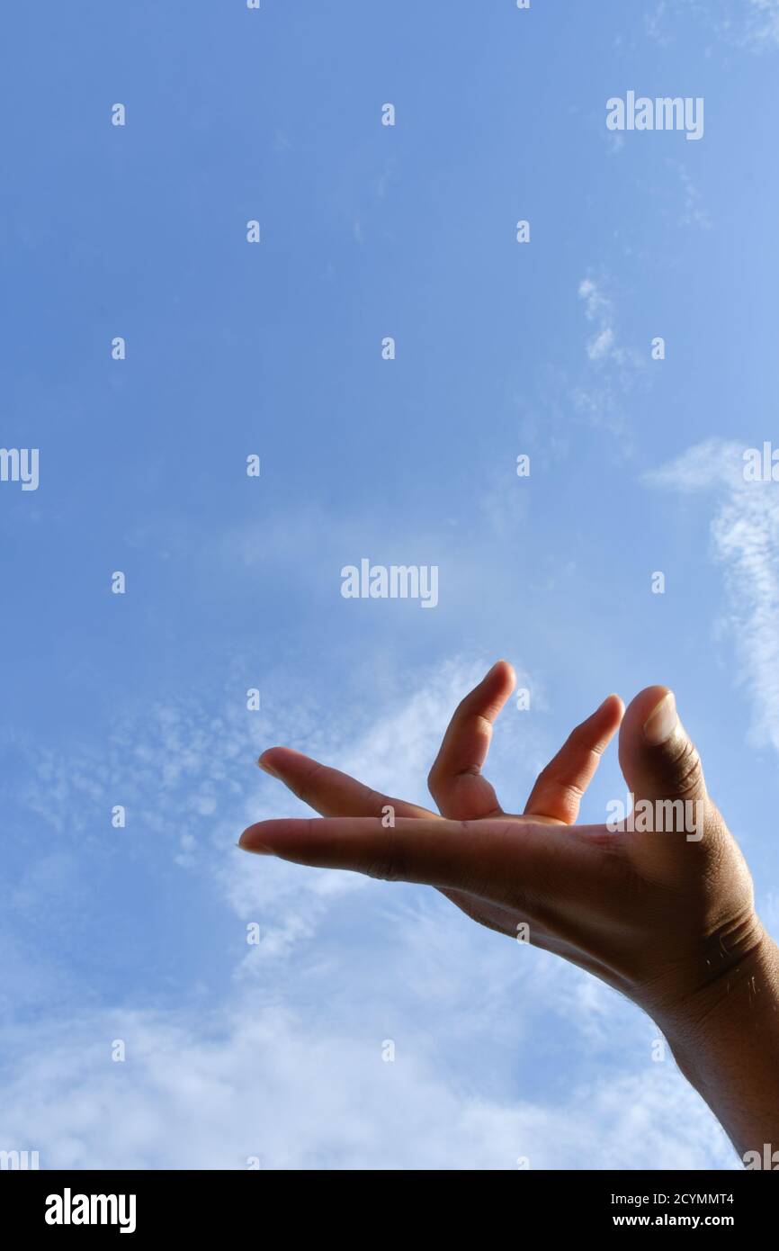 Man Hand Position, try to Touching the sky Stock Photo