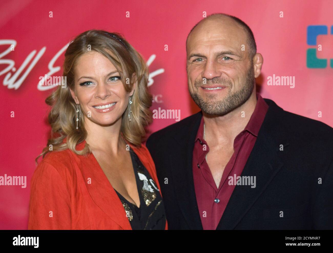 Annie Stanley and former mixed martial arts champion Randy Couture arrive for the 16th annual Keep Memory Alive 'Power of Love Gala' and 70th birthday celebration for Muhammad Ali at the MGM Grand Garden Arena in Las Vegas, Nevada February 18, 2012. Proceeds from the event benefit the Cleveland Clinic Lou Ruvo Center for Brain Health in Las Vegas and the Muhammad Ali Center in Louisville, Kentucky. REUTERS/Steve Marcus (UNITED STATES - Tags: ENTERTAINMENT SPORT BOXING) Stock Photo
