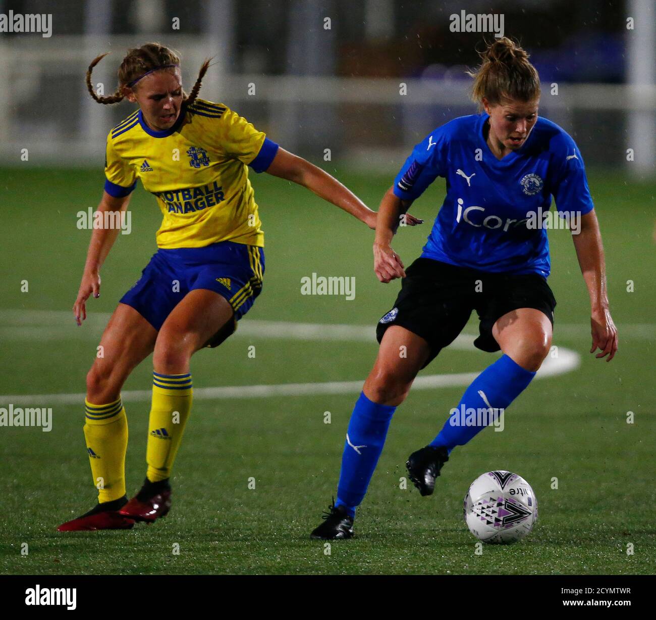 BILLERICAY, United Kingdom, SEPTEMBER 30: L-R Kelly Wealthall of Hashtag United Women and Hannah Porter of Billericay Town Ladies during South East Di Stock Photo