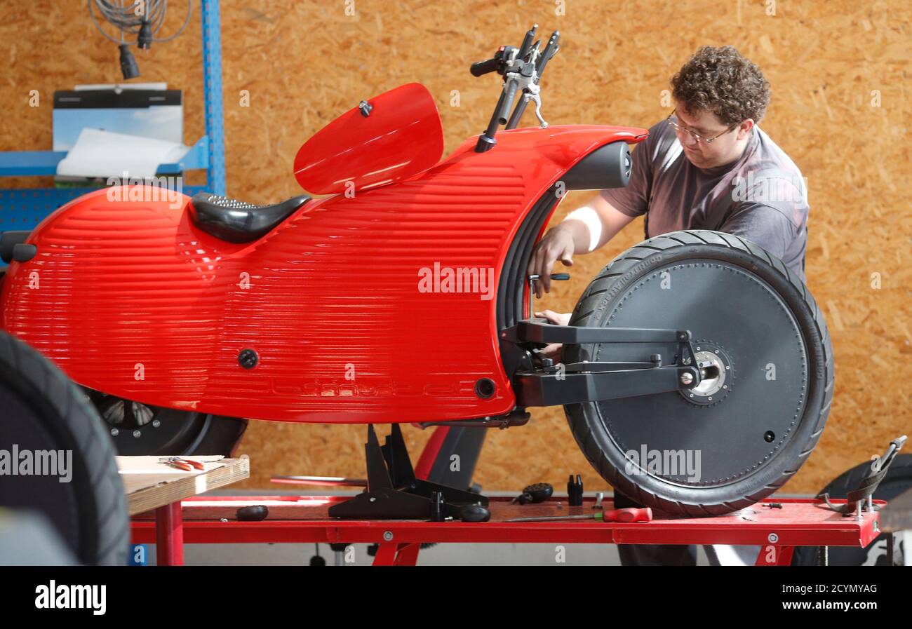 An Employee Of Johammer E Mobility Company Works On A J1 0 Electro Motorcycle At Their Headquarters In Bad Leonfelden April 23 14 The Johammer J1 0 Is The First Electro Motorbike In The World