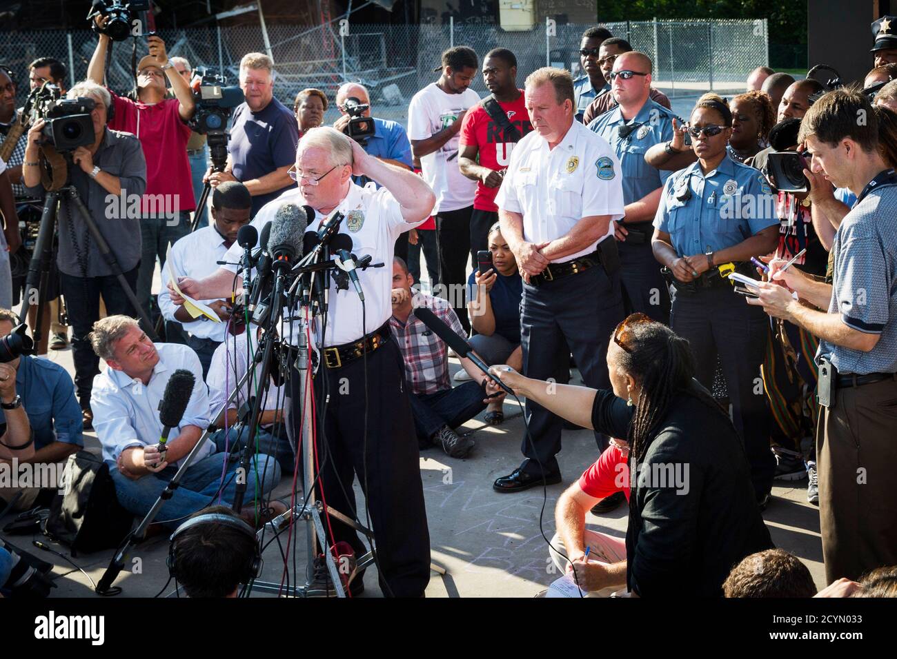 Ferguson Police Chief Thomas Jackson announces the name of the officer involved in the shooting of Michael Brown as officer Darren Wilson, in Ferguson, Missouri August 15, 2014. The briefing was held near a QuikTrip convenience store that had been burned amid protests over the shooting of Brown, 18, last Saturday. REUTERS/Lucas Jackson (UNITED STATES - Tags: CIVIL UNREST CRIME LAW) Stock Photo