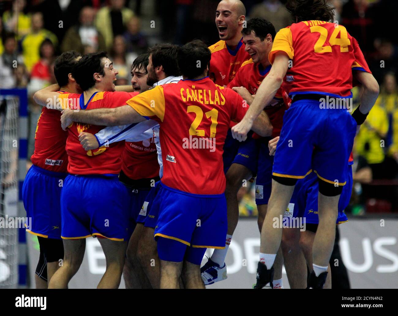 Spanish players celebrate defeating Sweden in their bronze medal match
