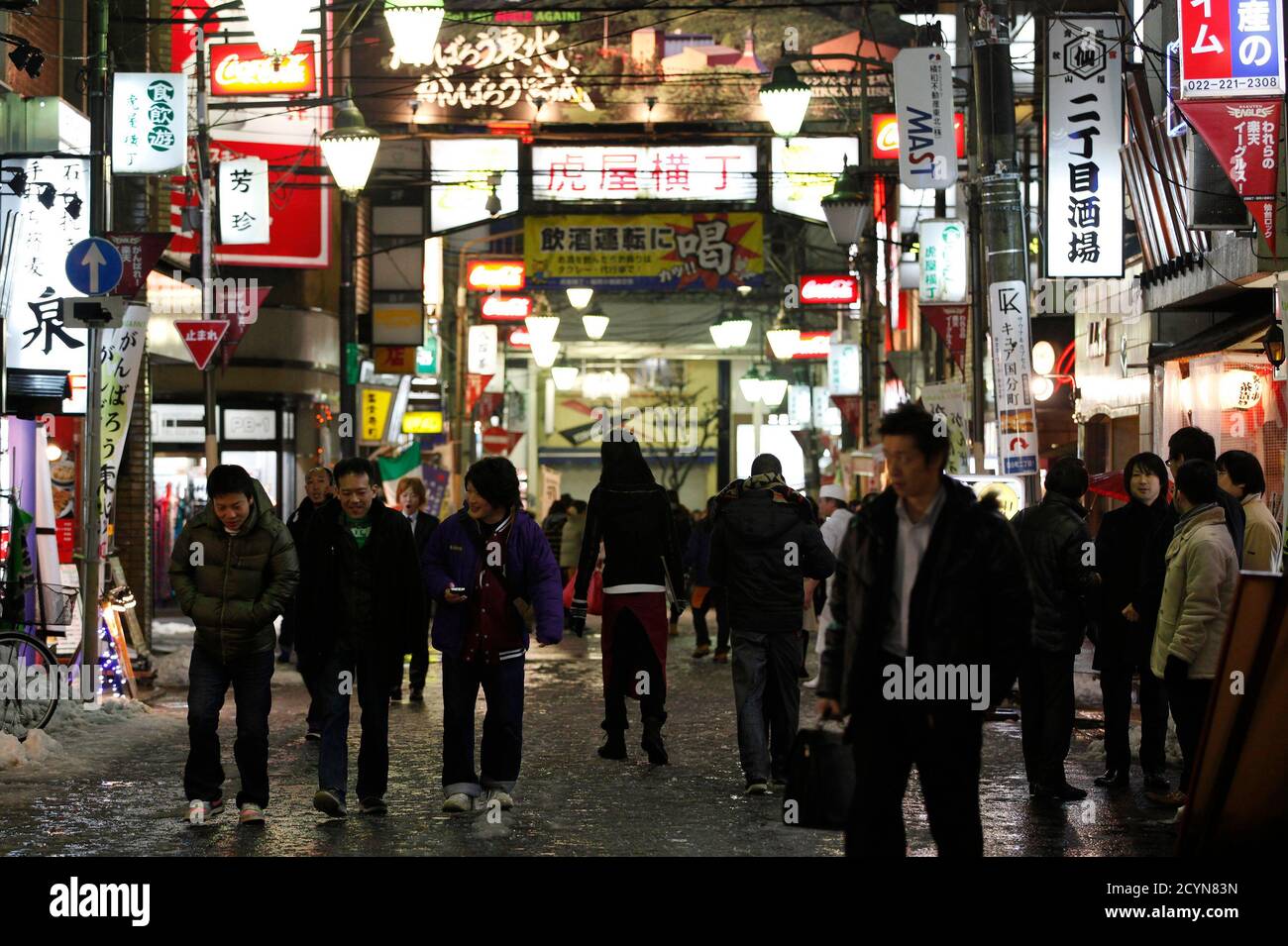 People Walk Through The Kokubuncho Entertainment District In Downtown Sendai Miyagi Prefecture Northeastern Japan February 25 12 After The March 11 11 Tsunami And Earthquake Much Of The New Business Is Gravitating