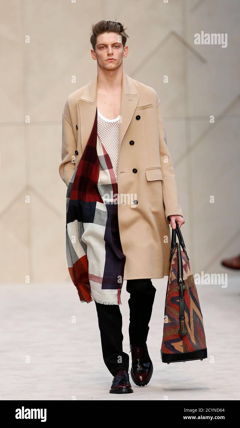 A model presents a creation from the Burberry Prorsum Autumn/Winter 2014  collection during "London Collections: Men" in London January 8, 2014.  "London Collections: Men" is a three-day showcase of men's fashion scheduled
