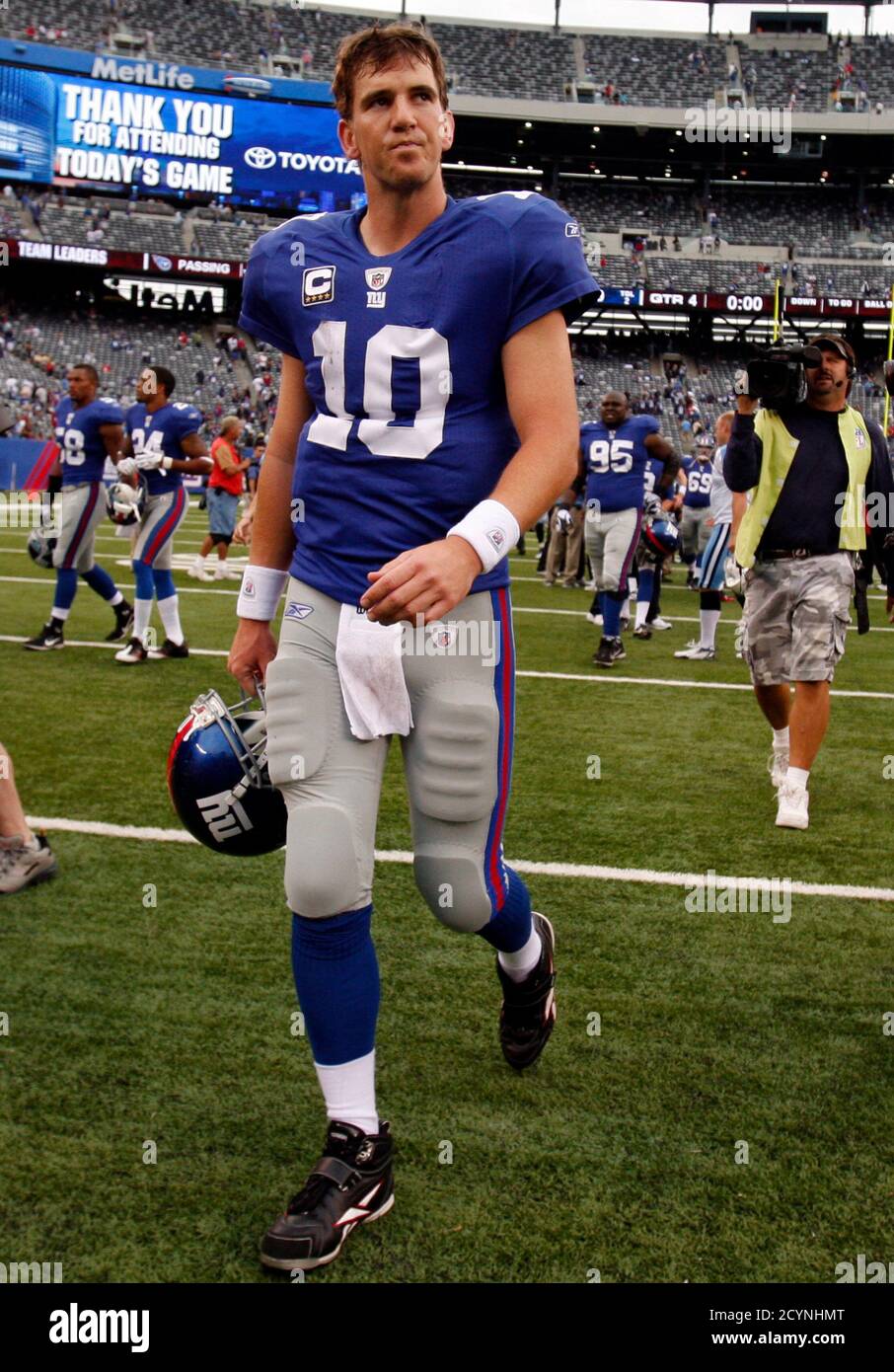 New York Giants quarterback Eli Manning leaves the field at the conclusion  of the fourth quarter of their NFL football game against the Tennessee  Titans in East Rutherford, New Jersey September 26,