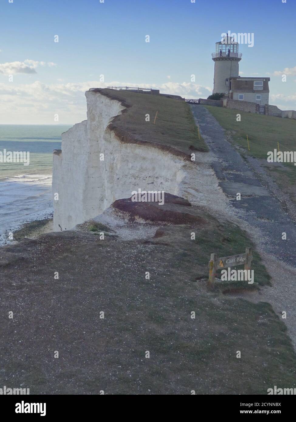 Eastbourne, East Sussex, UK. 25th Sep, 2020. Errosion seems to be accelerating after the heavy rain. The old pathway to the Belle Tout lighthouse now close to the cliff edge. The large fissure, a local walker advised, is widening daily it can not be long before a sizeable chunk crashes to the beach below. Credit: David Burr/Alamy Live News Stock Photo