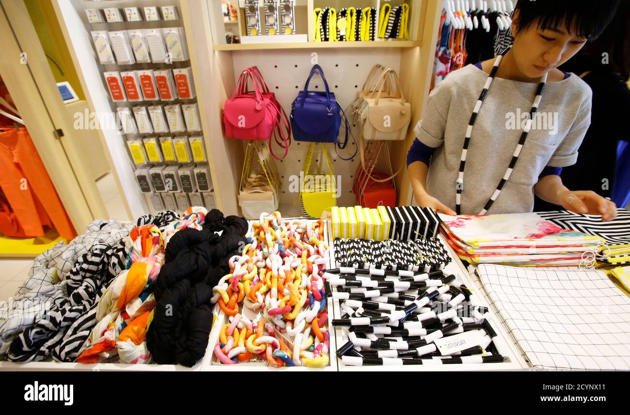 A Clerk Works At Kate Spade S New Saturday Label Store In Tokyo March 21 13 Kate Spade Saturday Opened Its First Store In Tokyo S Trendy Harajuku District Earlier This Month And Another A Clerk Works At Kate Spade S New Saturday Label Store In Tokyo March 21 13 Kate Spade Saturday Opened Its First Store In Tokyo S Trendy Harajuku District Earlier This Month And Another