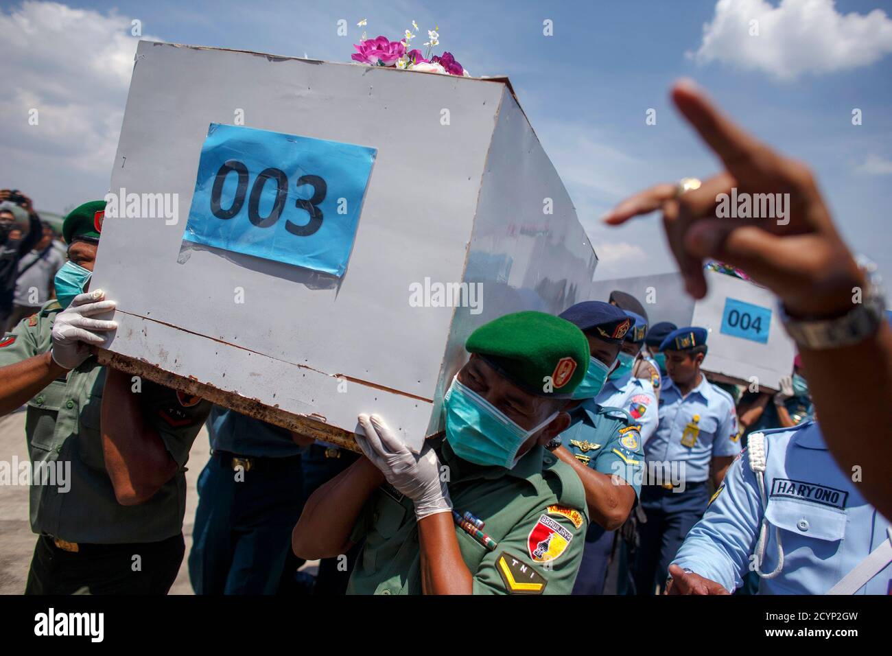 Indonesian Military Personnel Carry Caskets Containing The Remains Of Passengers Onboard Airasia Flight Qz8501 Recovered Off The Coast Of Borneo At A Military Base In Surabaya January 1 15 Divers Looking For Indonesian Military Personnel Carry Caskets Containing The Remains Of Passengers Onboard Airasia Flight Qz8501 Recovered Off The Coast Of Borneo At A Military Base In Surabaya January 1 15 Divers Looking For