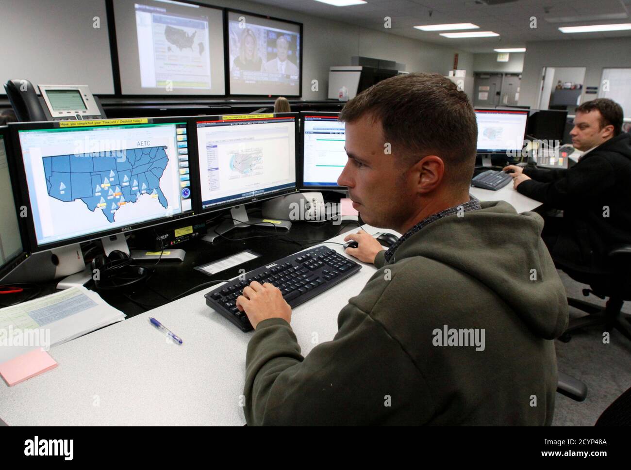 Josh Mayeux, network defender, works at the Air Force Space Command Network Operations & Security Center at Peterson Air Force Base in Colorado Springs, Colorado July 20, 2010. U.S. national security planners are proposing that the 21st century's critical infrastructure -- power grids, communications, water utilities, financial networks -- be similarly shielded from cyber marauders and other foes. The ramparts would be virtual, their perimeters policed by the Pentagon and backed by digital weapons capable of circling the globe in milliseconds to knock out targets.  To match Special Report  USA Stock Photo