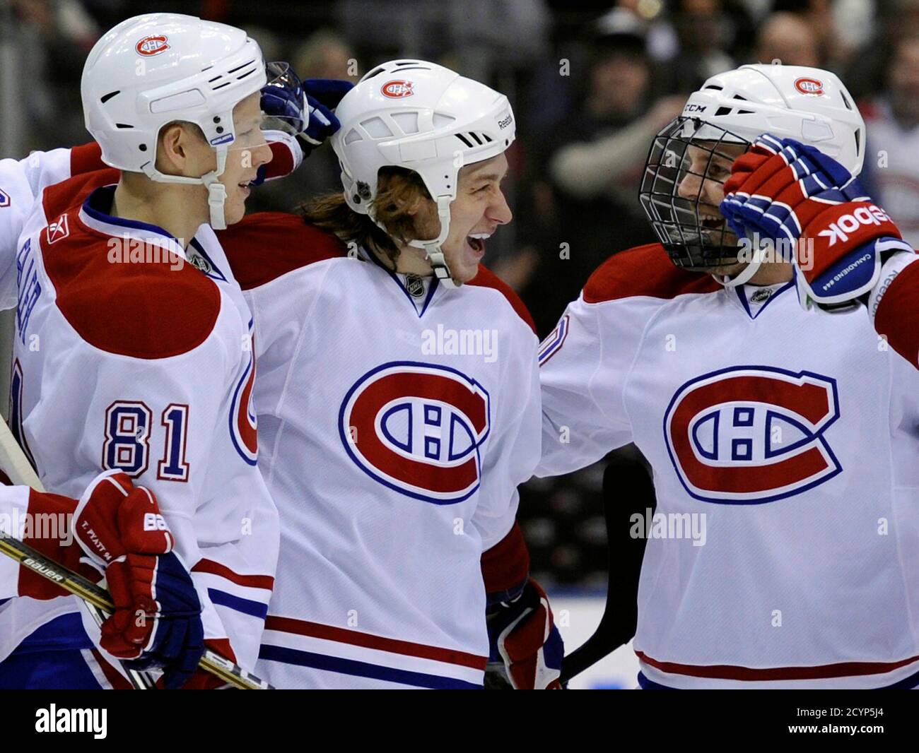 Montreal Canadiens Forward Ryan White C Celebrates His Goal Against The Toronto Maple Leafs With Lars Eller L And James Wisniewski During The First Period Of Their Nhl Hockey Game In Toronto