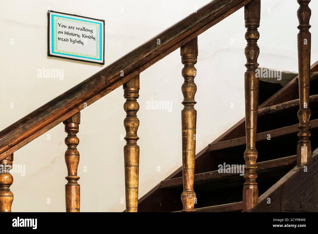 Stairway & sign in the Portuguese colonial style Old Courtyard Hotel in Fort Cochin; Princess St, Kochi (Cochin), Kerala, India Stock Photo
