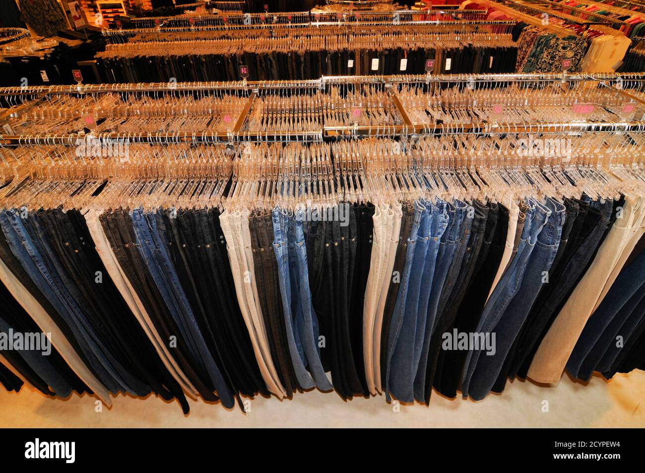 Pants Store pants in a clothing store, textile design and fashion trends Stock ...